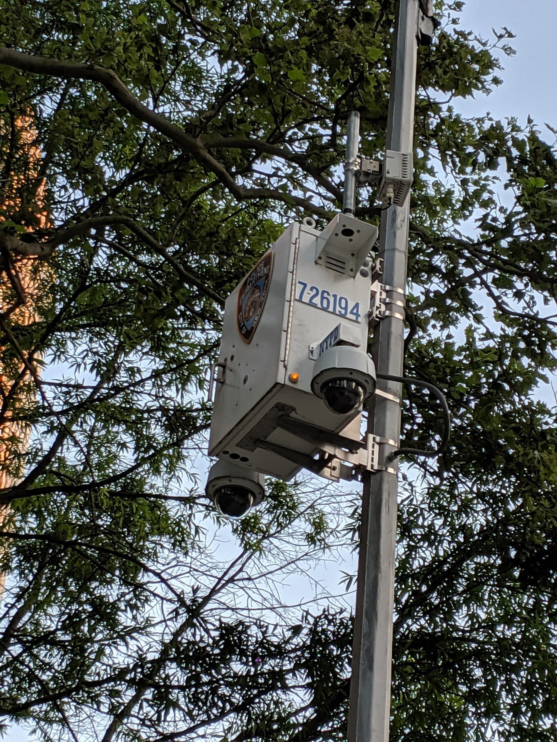 Security cameras watching an industrial site perimeter